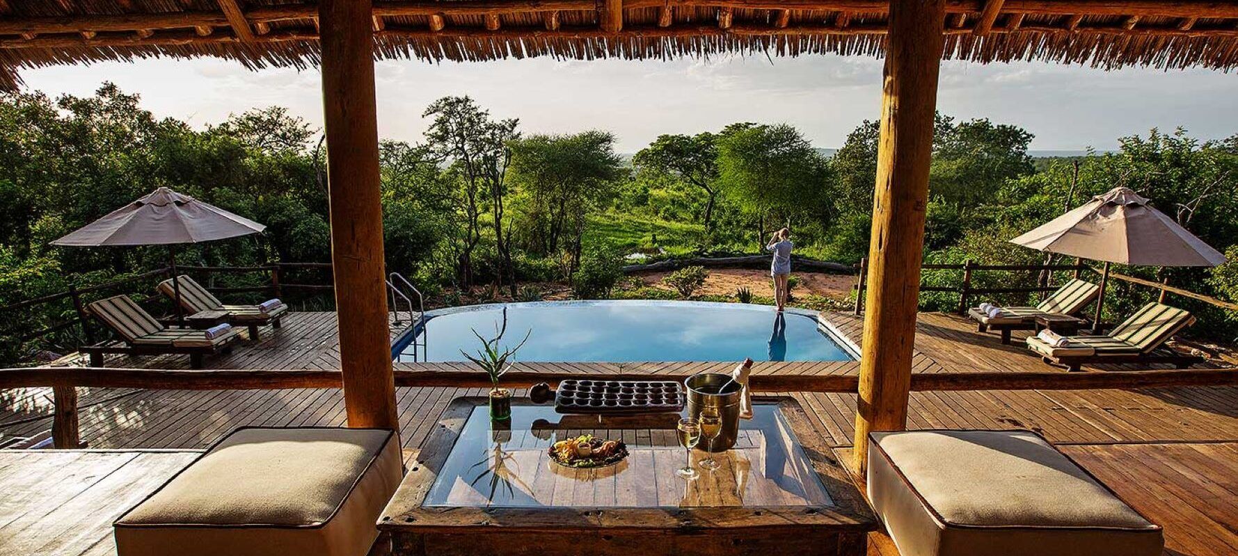 Tarangire Treetops by Elewana lodge with terrace, pool and green scenery