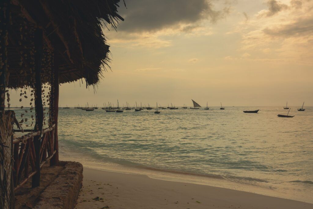 Beach of Nungwi, Tanzania, with a hut on the side during sunset